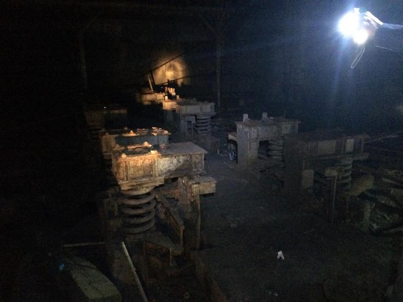 spooky old machinery in silo